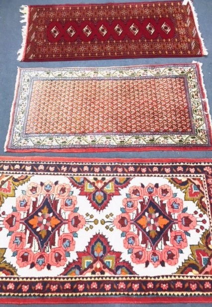 Three small Persian rugs 137 x 175cm 125 x 65cm and 130 x 61cm